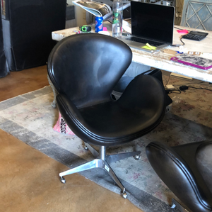 Leather Swivel chair on castors